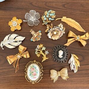 14 piece Elegant Gold and Silver tone Brooch set. Vintage and antique.